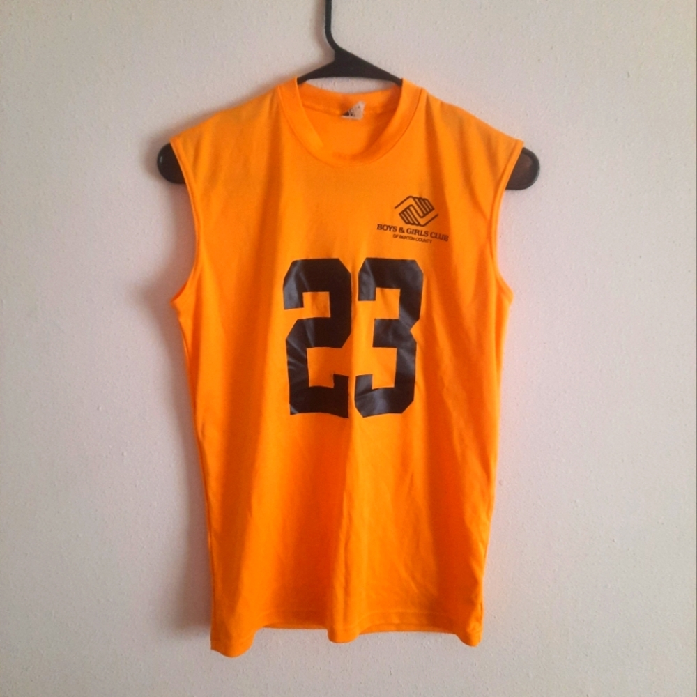 Gold boys and girls club jersey